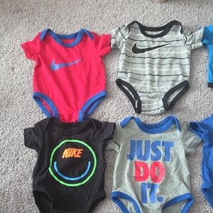 7 Piece Nike Kids Bodysuit Set - Red, Black, Gray, Blue